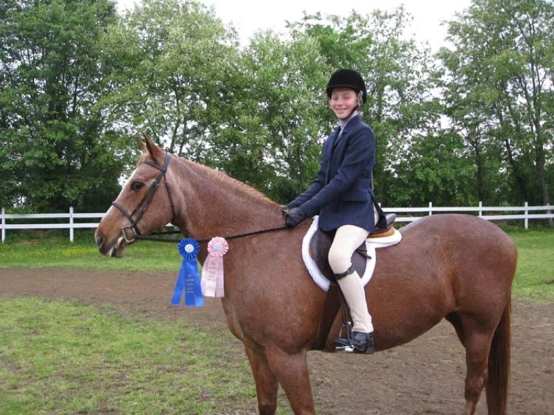 A young rider on a pony at Nimble Creek Farm